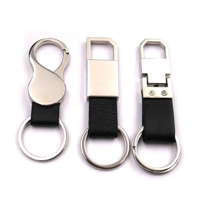 China Various factory manufacture logo keychains cheap custom embossed PU car leather keychain for sale