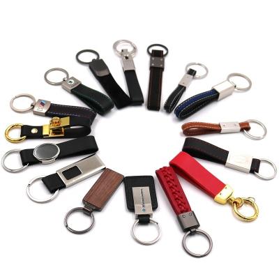 China New design custom embossed car logo embossed PU leather key chain keychain in high quality for sale