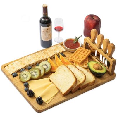 China Sustainable Bamboo Cutting Board With 4 Pieces Of Cheese Set Bamboo Board Knife for sale