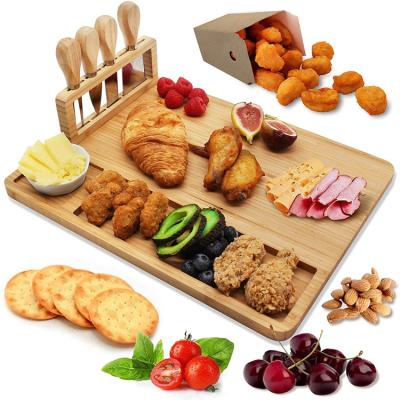 China Sustainable Bamboo Cutting Board With 4 Pieces Of Cheese Set Bamboo Board Knife for sale