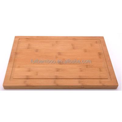 China Sustainable vegetable cutting board with deep juice groove for sale