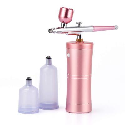 China Mini Airbrush Compressor Set Portable Dye Removal Air Brush Sprayer Gun Machine Oxygen Injector for sale