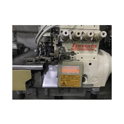 China Widely Used Second Hand Yamato CZ6020 Four Thread Overlock Sewing Machine Used For Making Shirts for sale