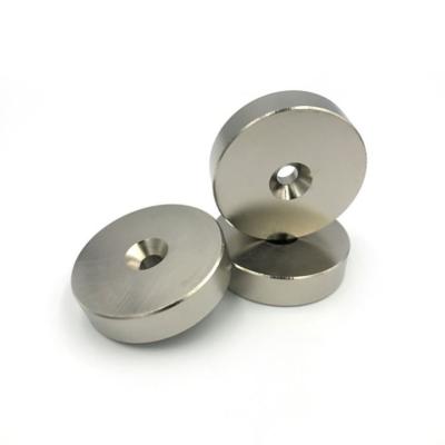 China Strong industrial magnet rare earth disc N35 N52 neodymium magnet with countersink for sale for sale