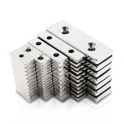 China Industrial Magnet Customized NdFeb Pot Channel N52 Industrial Strong Rectangular Neodymium Block Magnet With Countersunk Hole for sale