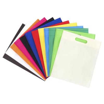 China 25*30cm Cheap Custom Logo Multi Color Eco-friendly No Polish Tejidas Reusable Eco Friendly D Cut Non Woven Bags Non Woven Bag for sale