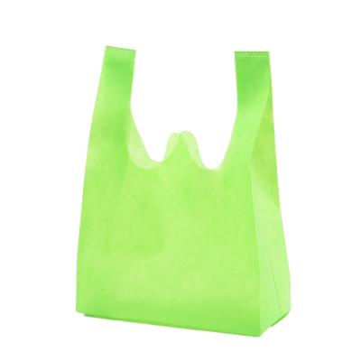 China New Design Eco - Friendly Reusable Processed W Cut Non Woven Vest Bag For Shopping for sale