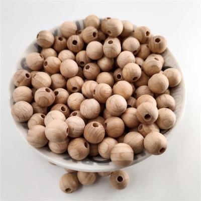 China Acrylic Natural Wooden Loose Beads Wooden Pacifier Beads 10mm Natural Beech Wood Round Beads for sale