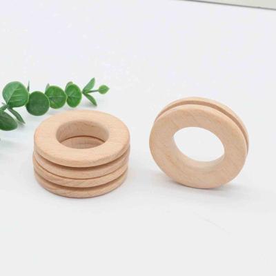 China Beech Wood Grooved Wooden Teether Baby Wooden Ring Beech Safe Teether Ring for sale