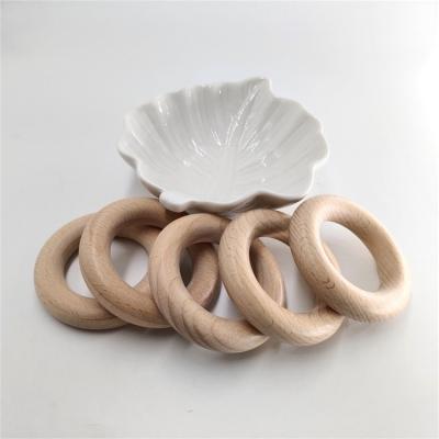 China Beech Wood 60x12mm Ring Natural Round Wooden Baby Teething Ring Circle DIY Necklace Ring for sale