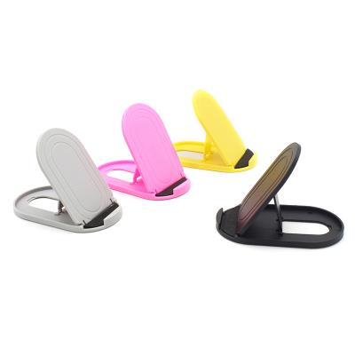 China Adjustable Desktop Multifunctional Folding Mobile Phone Holder Lazy Flexible Stand For Phone for sale