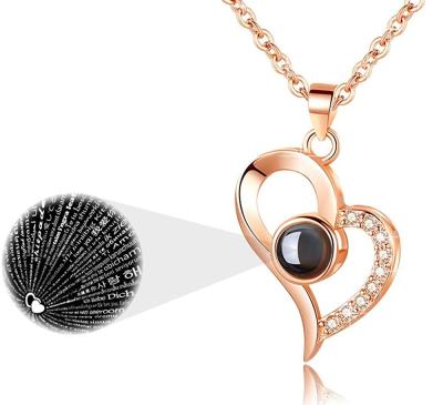 China Rose Gold Plated 2021 Romantic I Love You Crystal Heart Pendant Necklace Romantic Jewelry 100 Language Projection Chain For Women Gift for sale