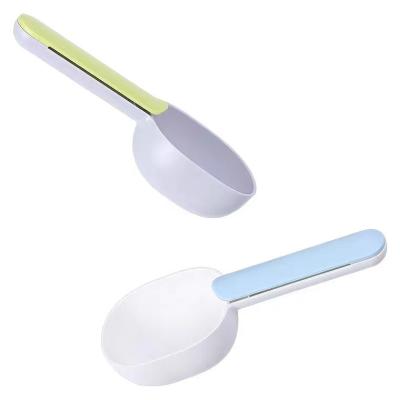 China 2020 New Style ABS Viable Wholesale Cat Shovel Dog Food Scoop Pet Measuring Cup Sealing Clip Spoon Dog Food Scoop for sale