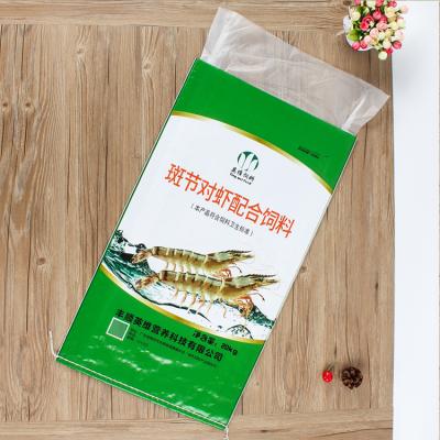 China Disposable 20kg pp bopp packaging empty plastic woven aquatic animal fish feed bag for sale