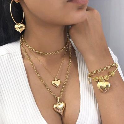 China European Fashion High Quality Jewelry Set Gold Plated Ladies Heart Necklace Dangling Multilayer Necklace Women Fashion Earring And Necklace Set for sale