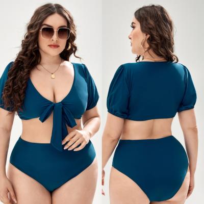 China 2022 new hot sale women's amazon plus size swimwear high waist split triangle solid color short sleeve lace up plus size bikini for sale