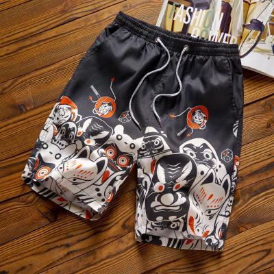 China 2022 summer new QUICK-DRY loose printing large size beach pants floral men's shorts men's casual quick-drying shorts for sale