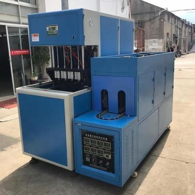 China Hot Sale 4 Cavity Bottle Semi Automatic Pet Bottle Blowing Machine For Making PP/PET Plastic Bottles for sale