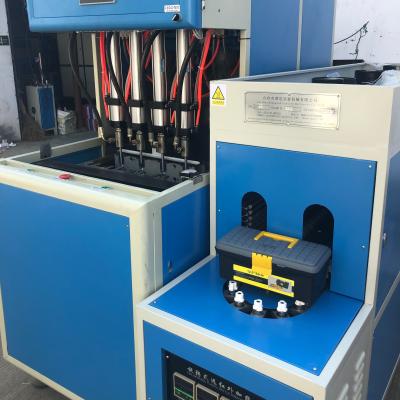 China Bottle Semi Automatic 4 Cavity Blow Molding Machine for sale