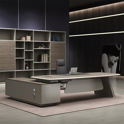 China Customized large high end luxury modern large furniture solid wood veneer stainless steel extendable executive desk for sale