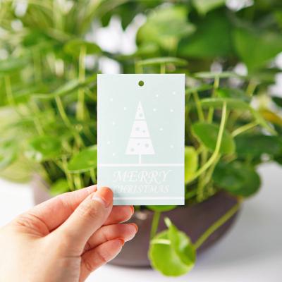 China Sustainable Hang Tag Party Swing Paper Card Merry Christmas Tree Decoration Label Painting Gift Wrapping for sale