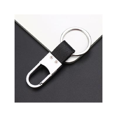 China Fashionable hot sales high quality fashion design metal and cortex car key chain for sale