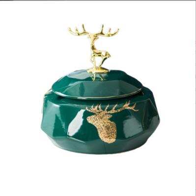 China Creative Deer Ceramic Creative Home Ashtray With Lid Dark Green Personalized Decorative Storage Cabinet for sale