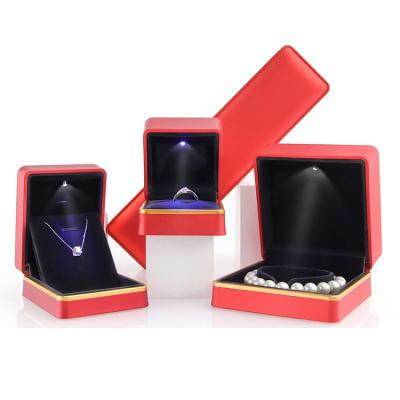 China Classic Elegant Vintage Jewelry Box Luxury Creative LED Inlay Gold Trim Paint Bakin Rings Box Custom Jewelry Package 100Pcs for sale