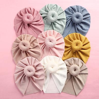 China Striped 18 Colors Spring Cute New Design Kids Toddler Hat Newborn Baby Boy Indian Knot Turban Hair Donut Beanie Hat for sale