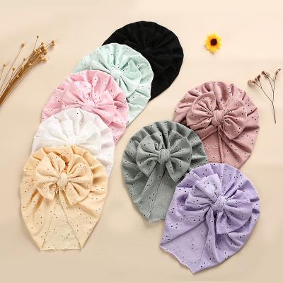 China New Summer Character 8 Color Mesh Bow Eyelet Soft Hollow Breathable Beanies Knotted Turban Bonnet Infant Toddler Girl Boy Hat for sale