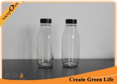 China Custom Empty Clear 16oz Square Glass Milk Bottles Wholesale With Tamper Evident Cap for sale