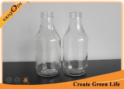 China Kitchenware 16oz Empty Glass Bottle for Sauce Preserving With Black Screw Lids for sale