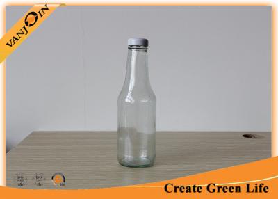 China Food Grade 350ml Clear Glass Sauce Bottles With Metal Twist Off Cap for sale