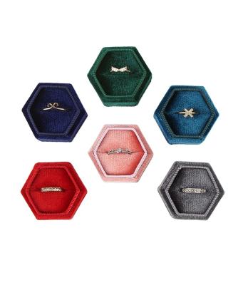 China Hot Selling Eco-friendly Portable Hexagon Jewelry Box Flannel World Cover Ring Necklace Box Proposal Jewelry Packaging for sale