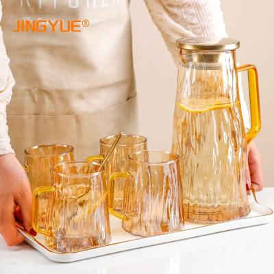 China Viable Nordics Accept Logo Customize 1.8L High Borosilicate Amber Glass Hot and Cold Juice Water Jug Set with 4 Cups for sale