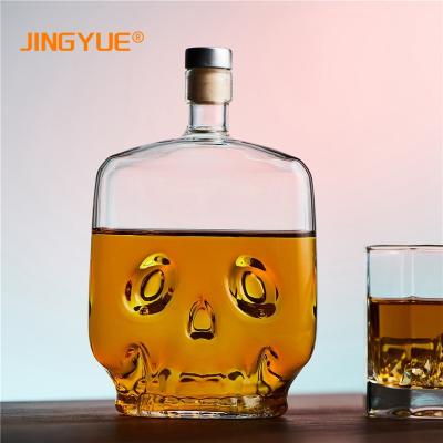 China 2021 New Clear Skull Vodka Shot Whiskey Decanter Bottle New Arrival 700ml Classic/Postmodern Creative Flat Square For Home Bar Office for sale