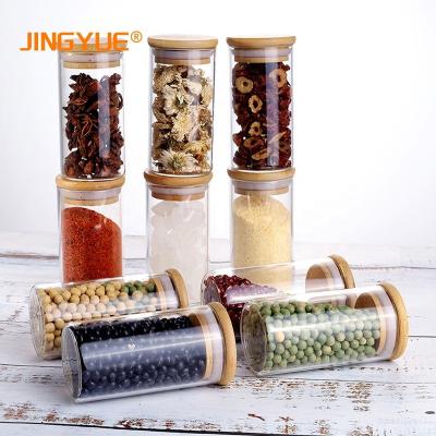 China Best Steamable Amazon Sller 170ml Mini Handmade High Borosilicate Airtight Glass Storage Jars Set With Bamboo Lids for sale