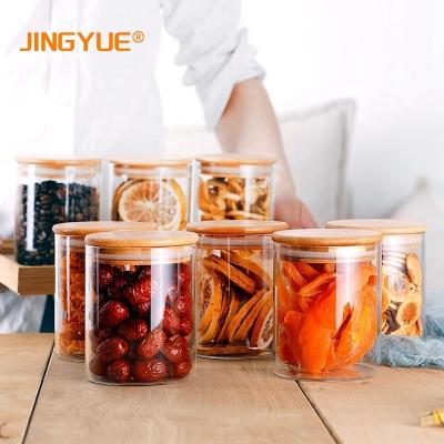 China 2021 New Arrival JINGYUE Wuhan Glass Storage Jar 250ml 250ml Clear Spice Viable Glass Jars Containers With Bamboo Lid forTea Coffee for sale