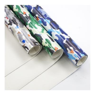 China Waterproof PVC Film Laminated Camouflage Dyed Fabric Leather For Shoes for sale