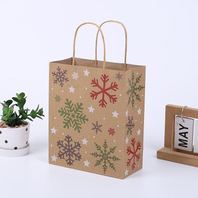 China Recycled Materials China Christmas Paper Gift Bags Creative Christmas Kraft Paper Bag Packing Bag for sale