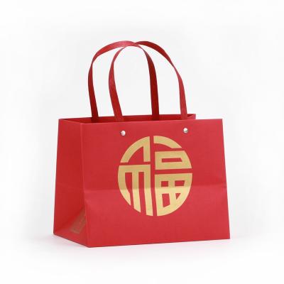 China Recyclable Custom LOGO Custom LOGO Wine Gift Cosmetic Shoe Store Handbag Shopping Bag Packing Pink Paper Bag for sale