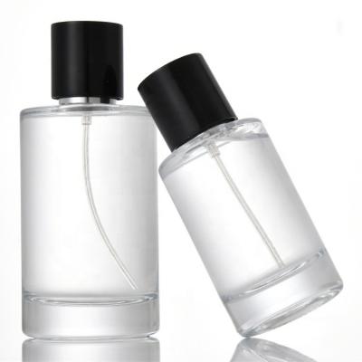 China Cosmetic High Quality Transparent Round Empty Glass Perfume Bottle With Spray for sale