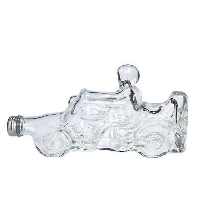 China New design sepical shape motorbike drink glass bottle with aluminum cap for sale