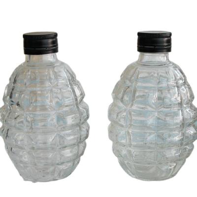 China Beverage 250ml 8oz Pomegranates Shape Glass Juice Bottle With Lid Special Shaped Glass Bottle for sale