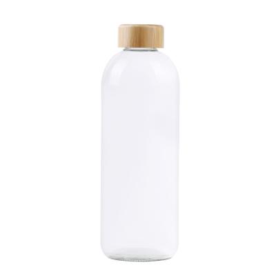 China Wholesale Custom Daily Life 1l 1000ml Clear Glass Water Bottles With Bamboo Lid for sale