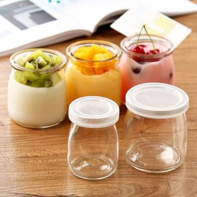 China Hot Selling 200ml Round Clear Food Yogurt Glass Pudding Jars With Cork Lids for sale