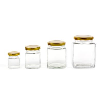 China 730ml Food Square Honey Glass Jar Airtight Glass Storage Jar With Metal Lid for sale