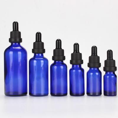 China Blue Cosmetic Screw Cap 100ml Essential Oil Cylinder Dropper Bottle for sale