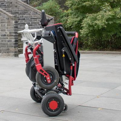 China Cepille la silla de ruedas eléctrica ligera del motor plegable para los minusválidos o los ancianos en venta