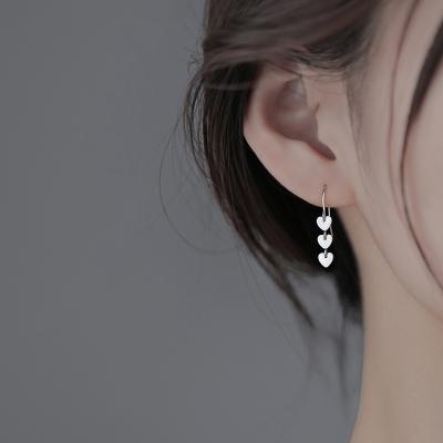 China Fashion new women's cute personality art literature heart-shaped tassel earrings simple soft long ear hook for sale